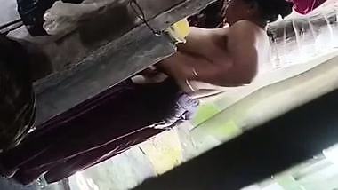 Son captures mom bathing in open backyard viral MMS