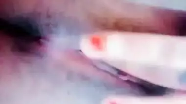 Lovely Desi teen moans while fingering own wet XXX vagina at home