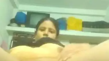 MILF showing big boobs and fingering pussy
