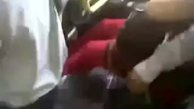 Man touching the boobs of a girl in the bus
