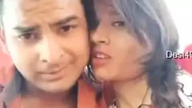 Handsome young man paws Indian's perfect boobs through red dress