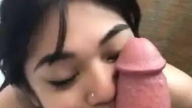 Beautiful girl sucking lover cock