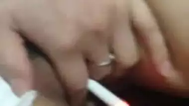 weird asian smoking cigerate with pussy