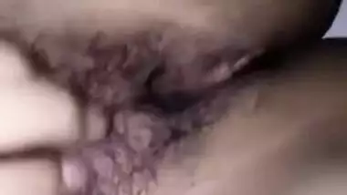 Indian girl slowly touches her small boobies and exposes hairy XXX pussy