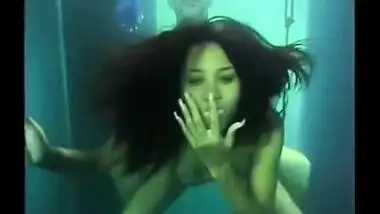 Chick gets fucked under pool water