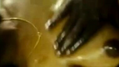 Indian aunty getting an boob massage with oil