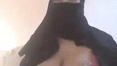Pretty Desi beauty in hijab demonstrates massive XXX jugs on camera