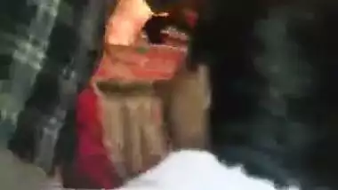 Shoving money in chaddi of the girl dancing mujra