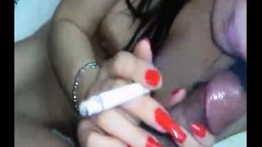 Sexy Indian babe giving blowjob and smoking