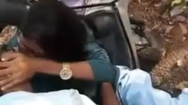 Indian young girl kissing her boyfriend