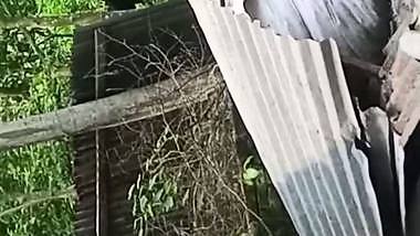 Village neighbor girl outdoor bath caught through hole