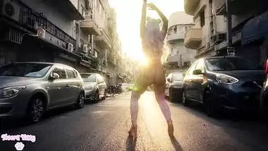 Colorful kawaii girl twerking in empty street during quarantine (no nudity)
