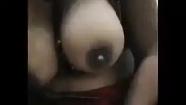 Breasty Indian girl exposes her smoking sexy large boobs