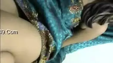 Solo Indian babe in a luxurious dress is excited so she touches tits