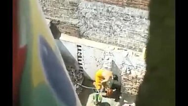 Spying india bhabi taking shower outdoor