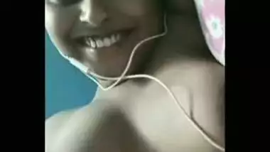 Indian girl listens to the music and exposes XXX tits on camera
