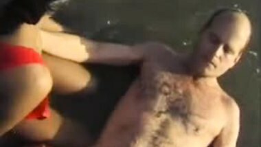 2 Indian girls with white guy in beach have fun blowjob.. 