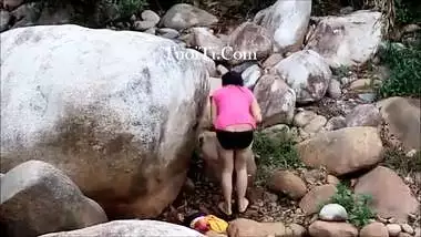 Hot Nepali girl dressing after an outdoor bath