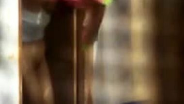 Desi Neighbour bachi Undressing for Bath Caught Topless