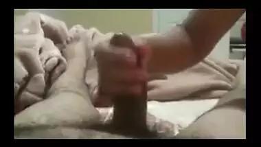 Indian aunty given hand job and playing with big cock