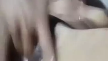 Nude Bangla girl sticks fingers into her juicy XXX cunt in Desi porn