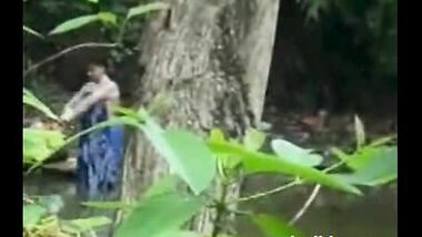 Village Lady Taking Bath Near River